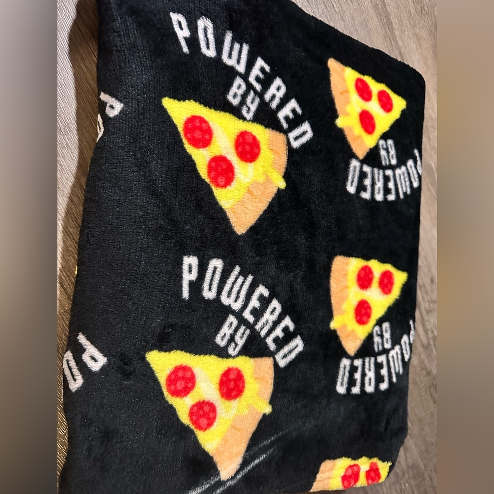 Powered by Pizza throw blanket